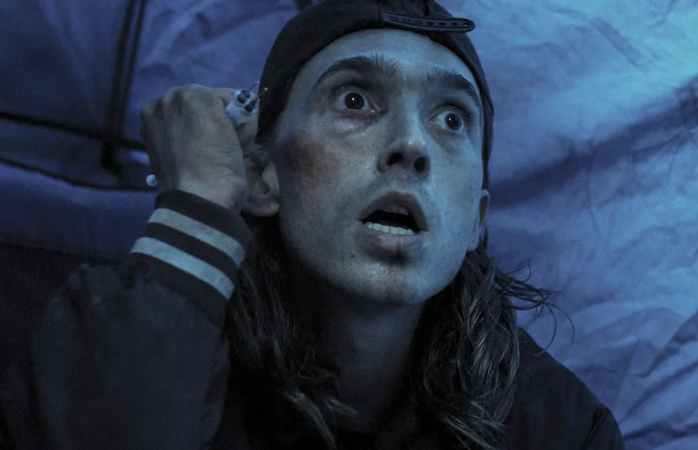 Austin Abrams in Zach Cregger's WEAPONS (Credit: Warner Bros.)